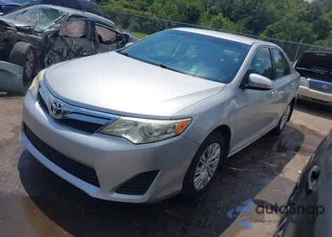 2014 Toyota Camry Le z USA, uszkodzony, nr VIN 4T4BF1FK5ER427343